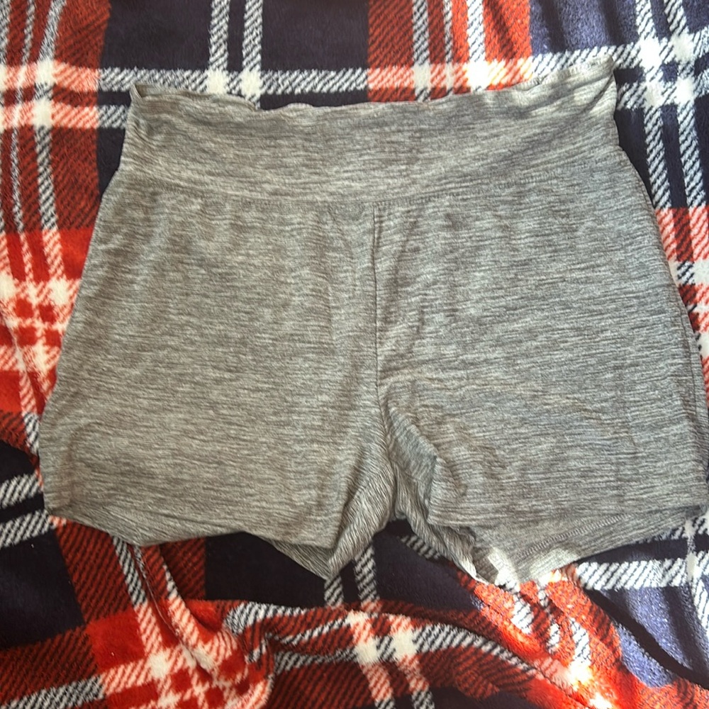 Grey stretchy shorts in a size medium barely worn